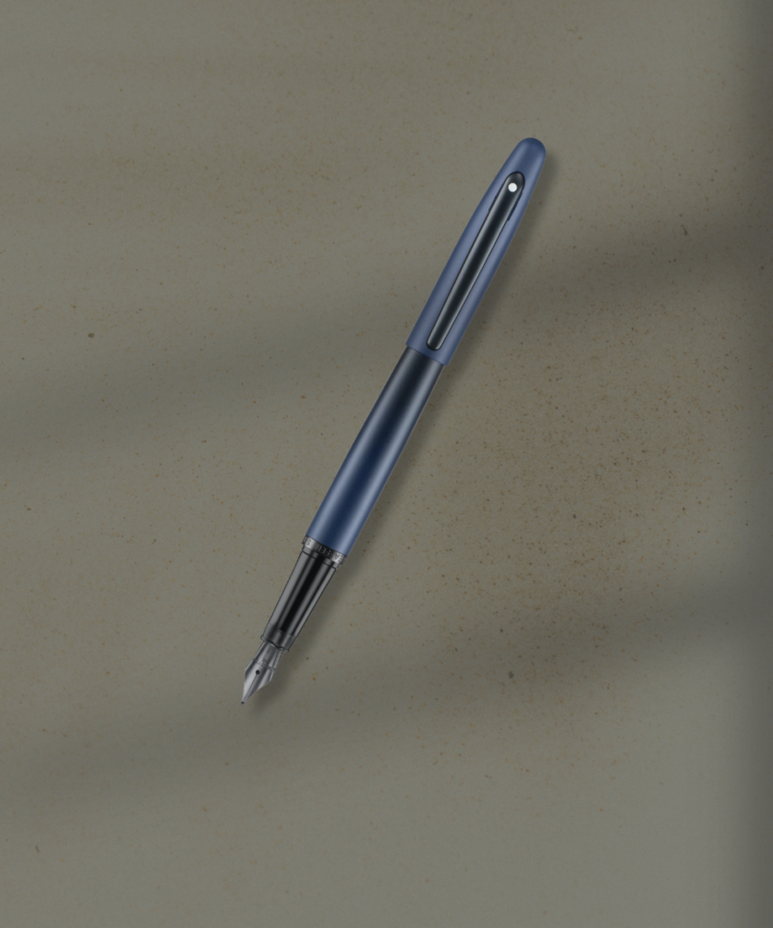 Blue fountain pen with silver nib resting diagonally on a beige textured surface.