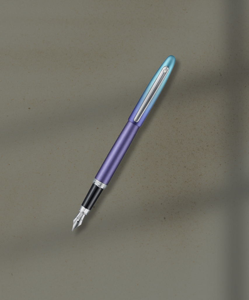 Purple and teal fountain pen lying diagonally on a beige textured background, ready for writing.