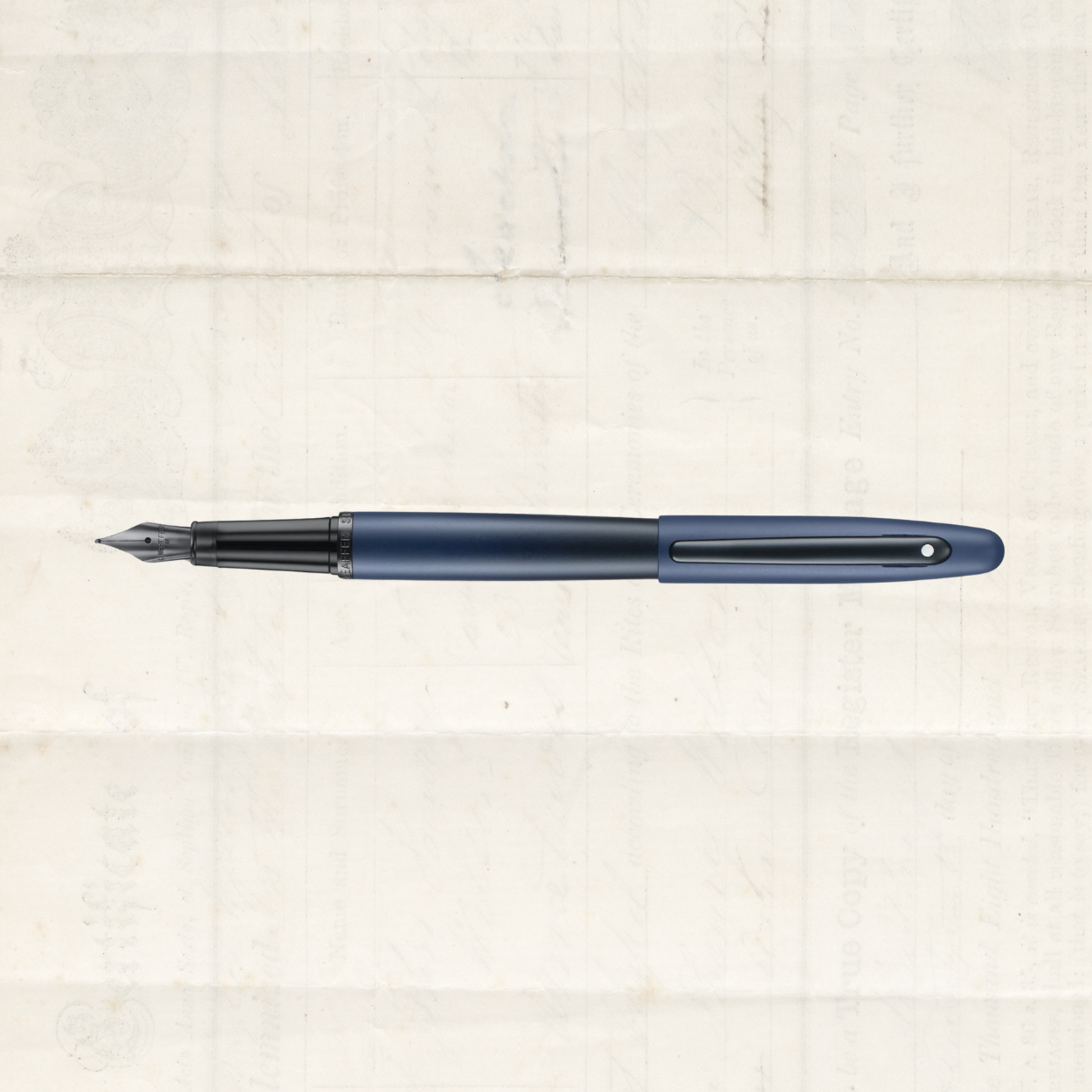 Blue fountain pen with a silver nib lying horizontally on a pale textured background.