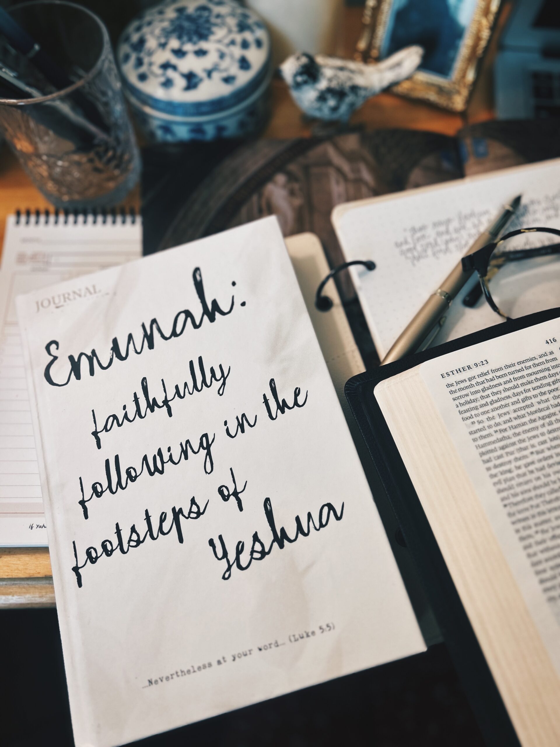 emunah journal on table with Bible