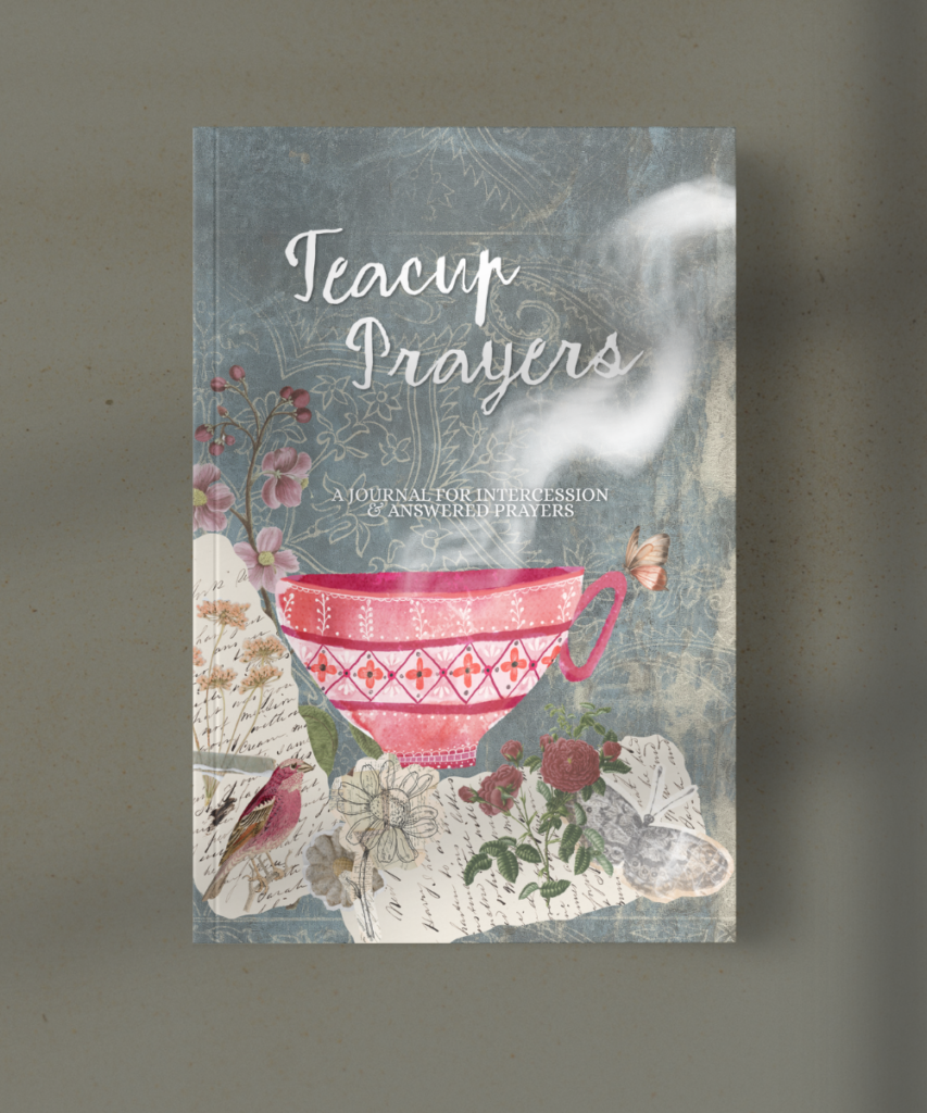 Book cover titled Tea Cup Prayers with a pink patterned teacup and floral collage on a blue-gray background, with wisps of steam and handwritten elements.